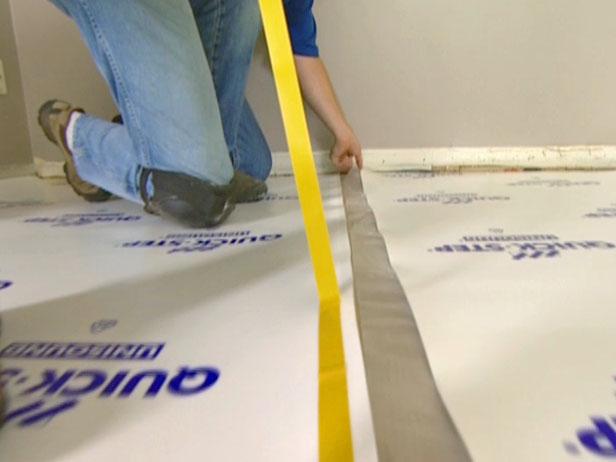 covering the floor with underlayment covering the floor with underlayment