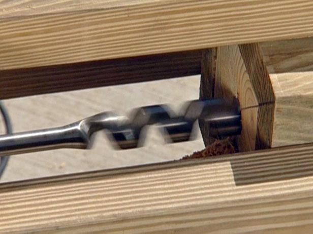 use jigsaw to drill out hole in center of posts use jigsaw to drill out hole in center of posts