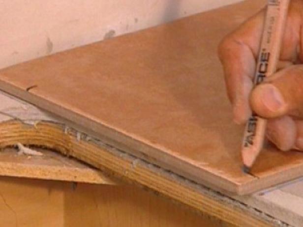 mark the tiles for cutting mark the tiles for cutting