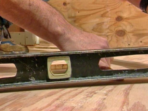 check for dips and valleys in floor by using level check for dips and valleys in floor by using level