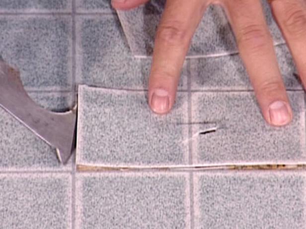 remove damaged vinyl square away from adhesive remove damaged vinyl square away from adhesive