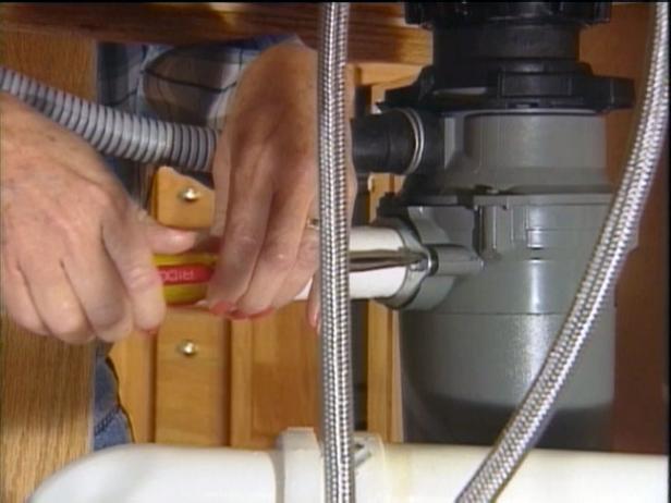disconnect drain arm from disposal unit disconnect drain arm from disposal unit