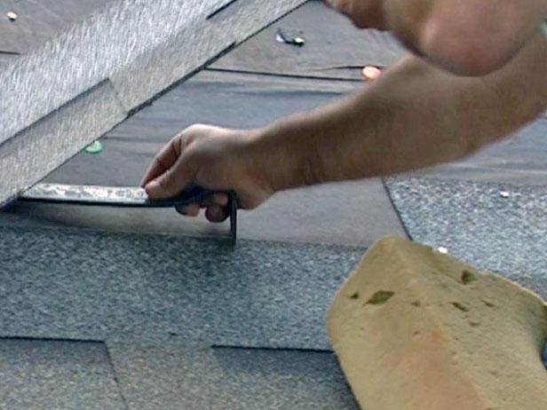 insert flat prybar between shingles to break seal insert flat prybar between shingles to break seal