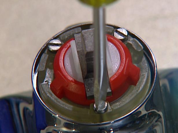 remove decorative cap and lift out cylinder remove decorative cap and lift out cylinder