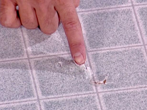 scrap piece of flooring used to repair damage scrap piece of flooring used to repair damage