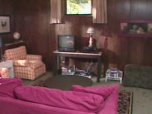 old paneled room looked dark,worn and outdated old paneled room looked dark,worn and outdated