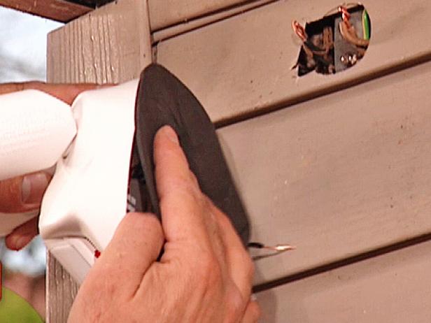 On flat exterior surfaces, install the neoprene gasket behind the fixture to prevent water from seeping into the back. This fixture is designed for wet locations so the gasket is not needed. Although most exterior light fixtures are waterproof, check to be sure that the model you've selected is suitable for wet locations.