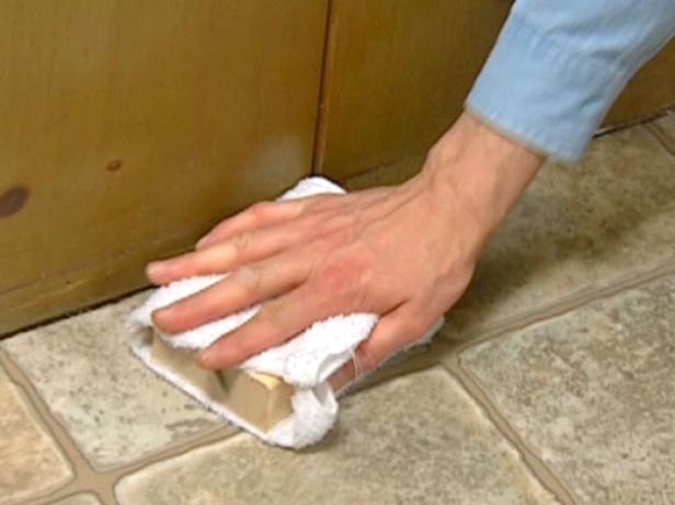 seat flooring to adhesive with hand roller seat flooring to adhesive with hand roller