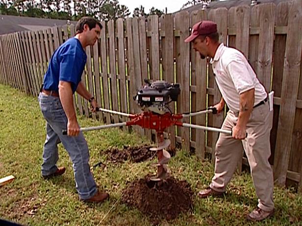 dig holes for posts using post hole digger dig holes for posts using post hole digger
