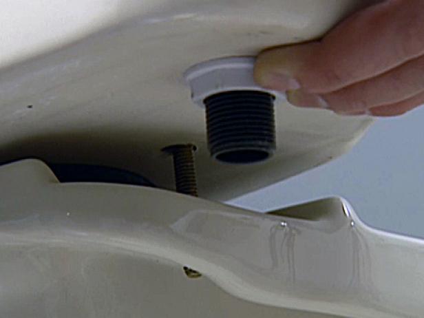 secure tank to bowl by tightening nut to bolt secure tank to bowl by tightening nut to bolt