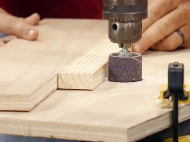 push piece to be sanded between fence and drum push piece to be sanded between fence and drum