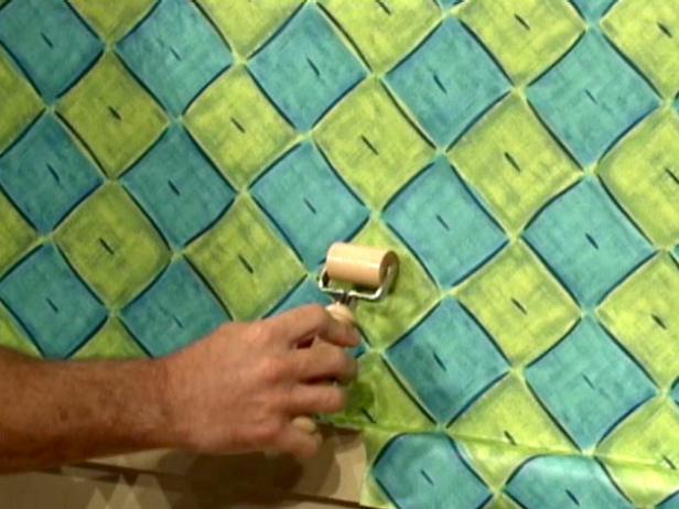 seam roller presses seams between wallpaper sheets seam roller presses seams between wallpaper sheets