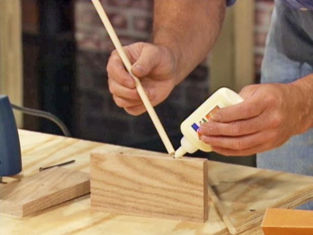 apply wood glue to holes in wood block apply wood glue to holes in wood block