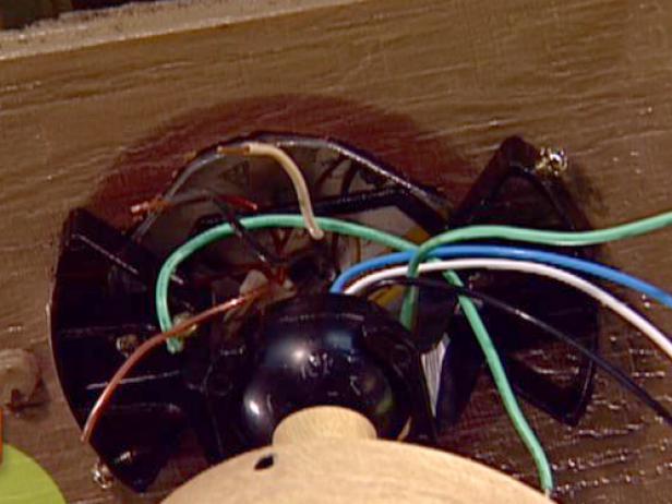 fan motor slips into swivel ball and into bracket fan motor slips into swivel ball and into bracket