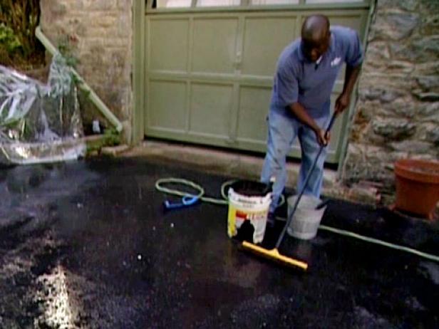 sealer applied to wet driveway with brushes sealer applied to wet driveway with brushes
