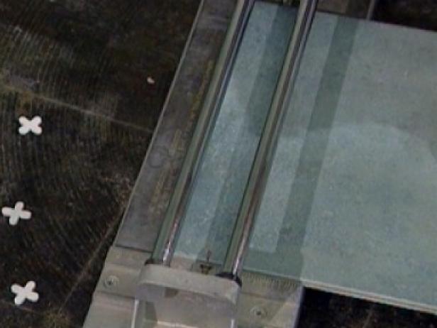use tile cutter to mark and make cuts on tiles use tile cutter to mark and make cuts on tiles