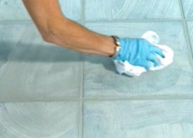 wipe away excess grout with damp sponge wipe away excess grout with damp sponge