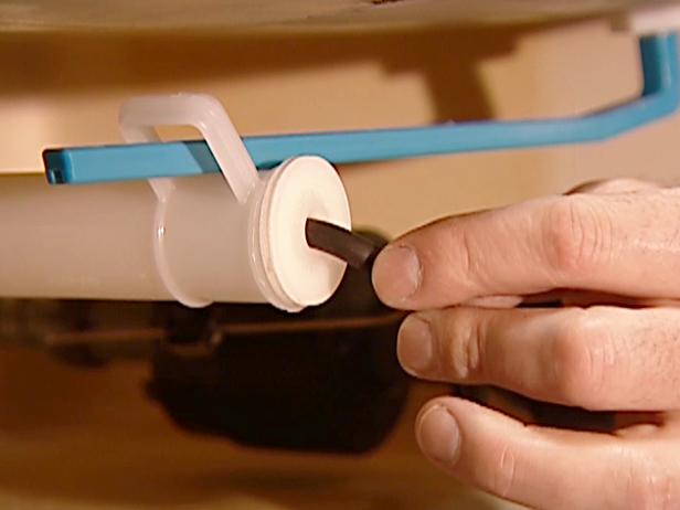 After you have replaced the float, make sure you remember to replace the overfill tube. Thread the tube back through the hole. Without this tube, the bowl will not fill up during the flushing cycle.