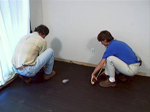 Laying felt on subfloor for hardwood installation Laying felt on subfloor for hardwood installation