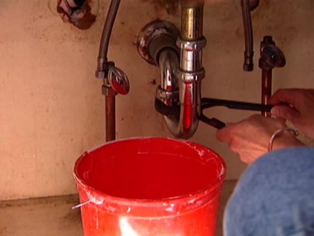 remove P trap and disconnect drain remove P trap and disconnect drain