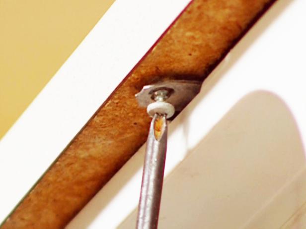 remove screws secured to underside of counter remove screws secured to underside of counter