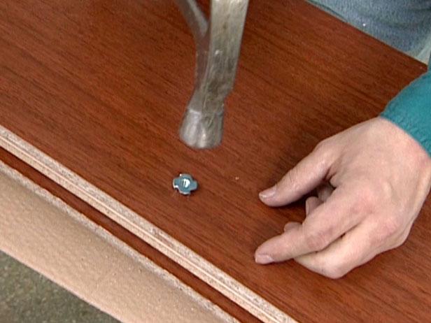 T nut has sharp points that are tapped into wood T nut has sharp points that are tapped into wood