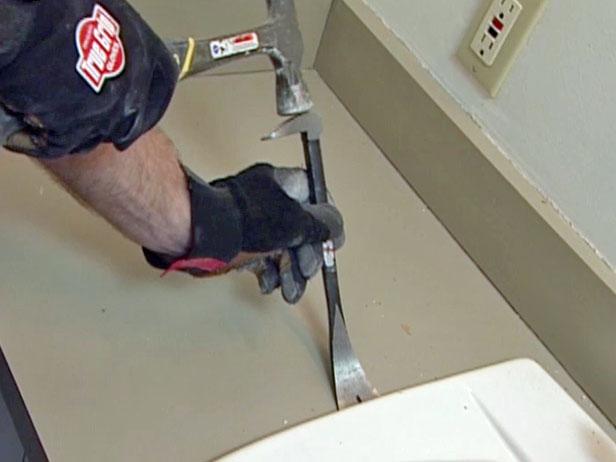 use pry bar to remove backsplash around cabinet use pry bar to remove backsplash around cabinet