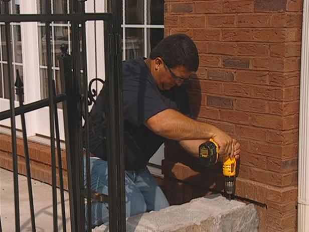 installing first section of fence installing first section of fence