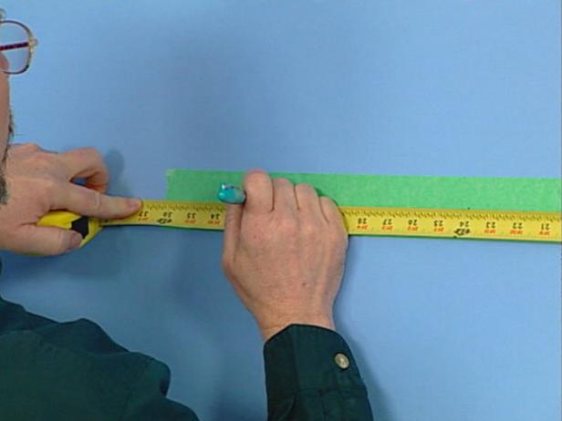 begin measuring and marking walls for stripes begin measuring and marking walls for stripes