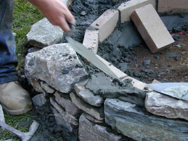 each new stone set on mortar and set with trowel each new stone set on mortar and set with trowel