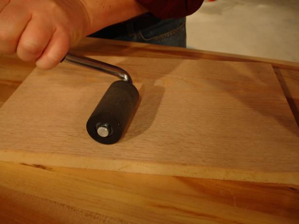 use a veneer roller to make sure veneer is flat use a veneer roller to make sure veneer is flat