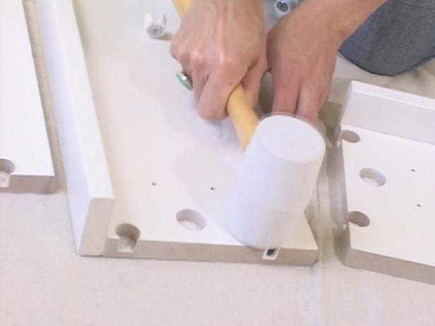 use a white rubber mallet use a white rubber mallet