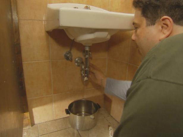 a bucket under the trap will catch excess water a bucket under the trap will catch excess water