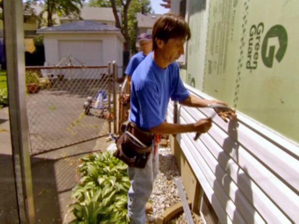 Installing vinyl siding Installing vinyl siding