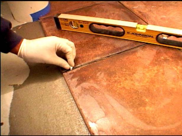 place spacers between each corner of tile place spacers between each corner of tile