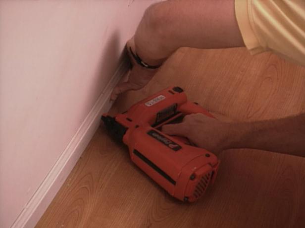 remove spacers around border and install baseboard remove spacers around border and install baseboard