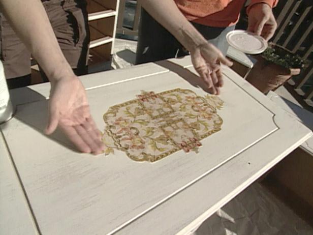cut out a medallion and brush with varnish cut out a medallion and brush with varnish