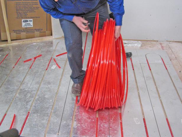 put PEX pipe into track put PEX pipe into track
