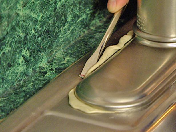 remove any excess putty from around escutcheon remove any excess putty from around escutcheon