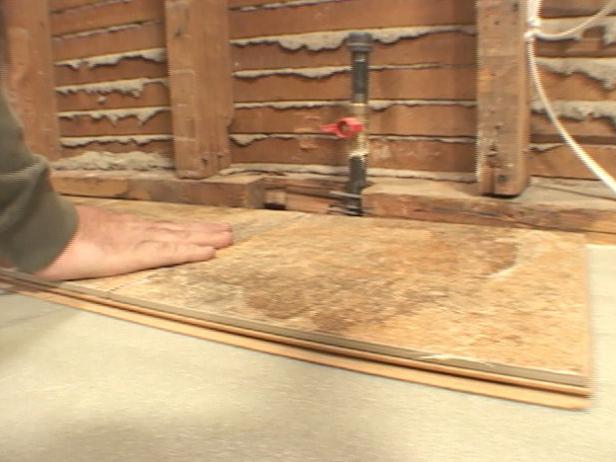 start laying tile against wall start laying tile against wall