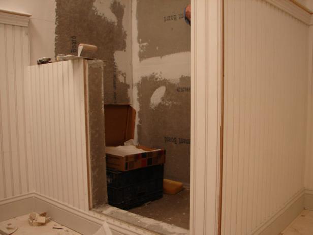 Once removal of the old tile is complete, install a cement backer board in the shower area (Image 1).