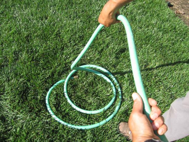 managing a garden hose managing a garden hose