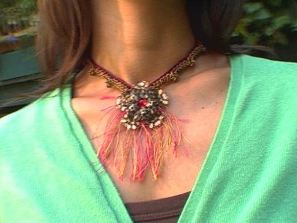 filigree flower crochet necklace has metal detail filigree flower crochet necklace has metal detail