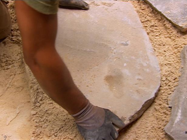position each piece of flagstone and level position each piece of flagstone and level