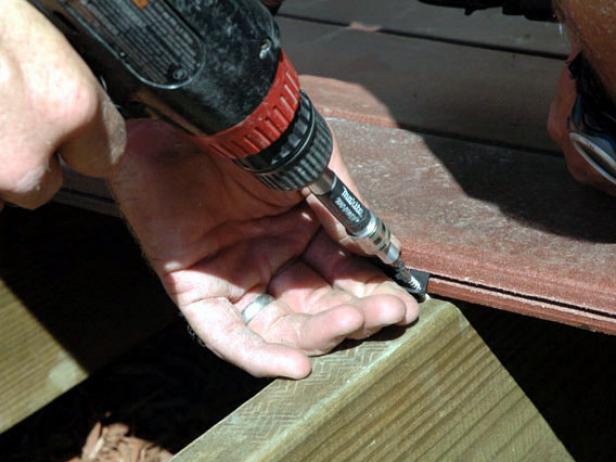 Special fasteners called tiger claws secure the remaining planks (Image 3). These are hidden under the planks.
