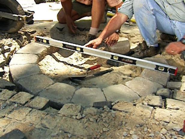 level first course to assure stones are firmly set level first course to assure stones are firmly set
