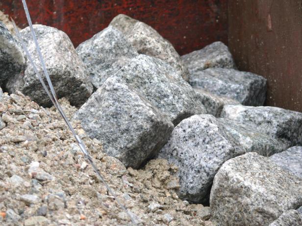 For this project, we also used about 25 four-inch cobblestones to edge the portion of the walkway that runs through a flowerbed.
