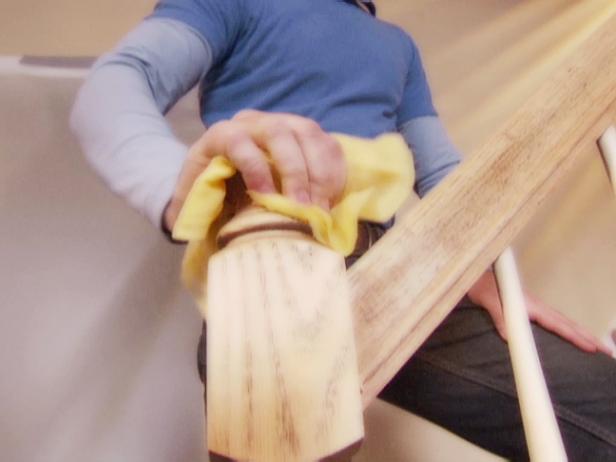 dbas337_Wiping-banister-with-cloth dbas337_Wiping-banister-with-cloth
