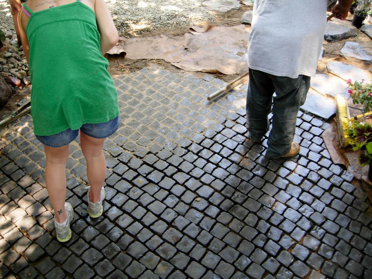 How to Install a Cobblestone Patio on Concrete or Bare Soil howtos DIY