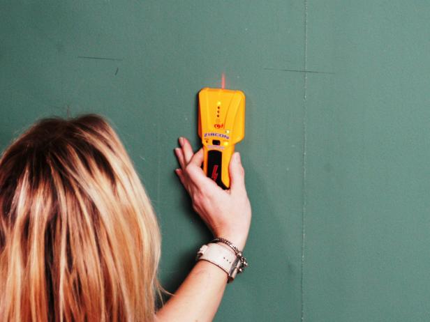 Start by marking all the wall studs. In most cases, wall studs are spaced 16 inches on center, or use an electronic stud finder to precisely locate them.